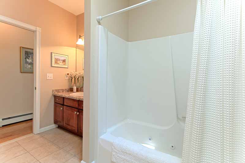 View of main bath with bath tub/shower